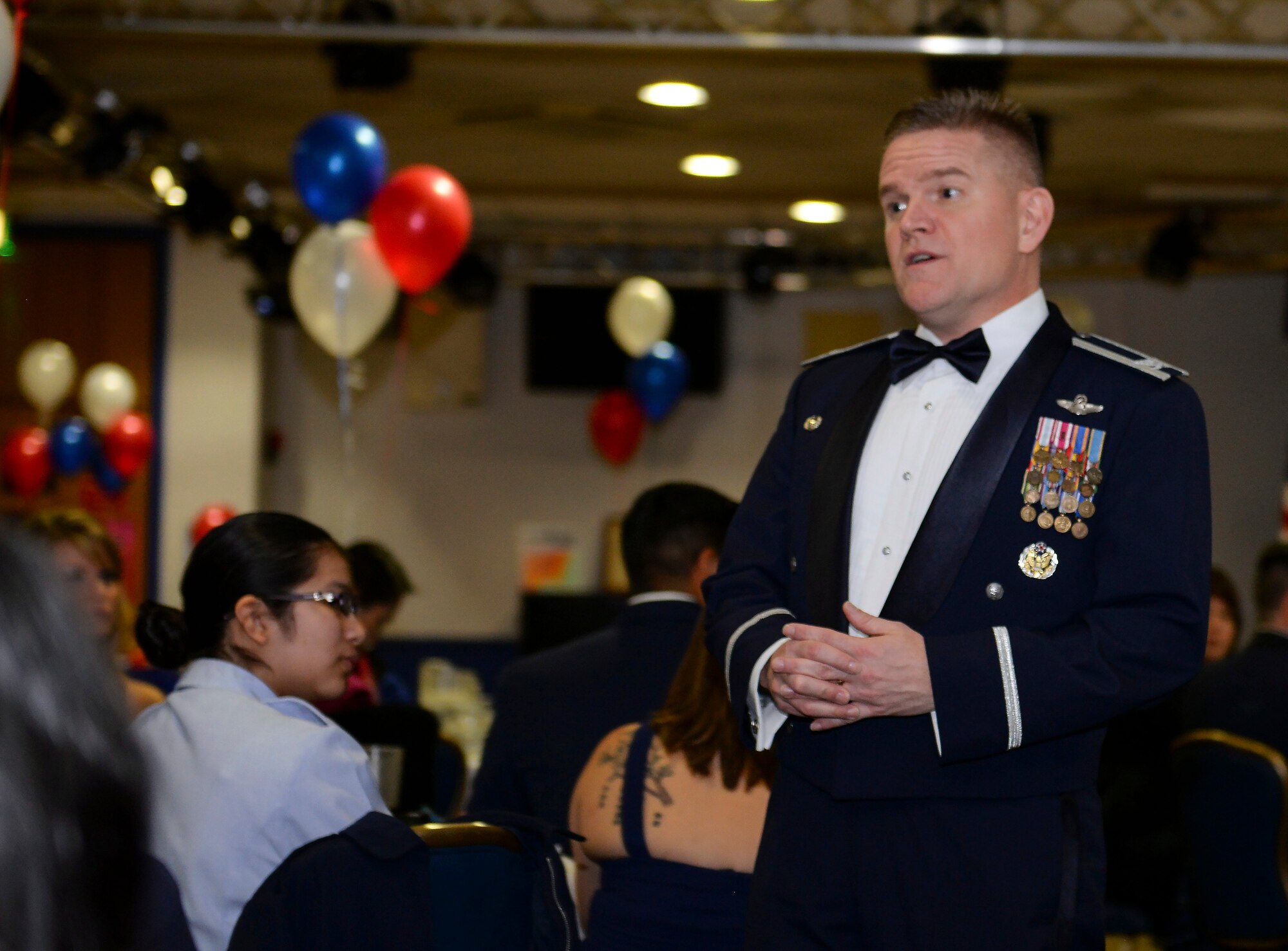 U.S. Air Force Col. Thomas D. Torkelson, 100th Air Refueling Wing commander, gives a speech during the Civil Air Patrol dining out March 12, 2016, at the Liberty Club on RAF Lakenheath, England. Torkelson was invited to the event as a guest speaker to commemorate the Mildenhall Cadet Squadron’s first year since the unit was activated on March 2, 2015. (U.S. Air Force photo by Staff Sgt. Micaiah Anthony/Released)