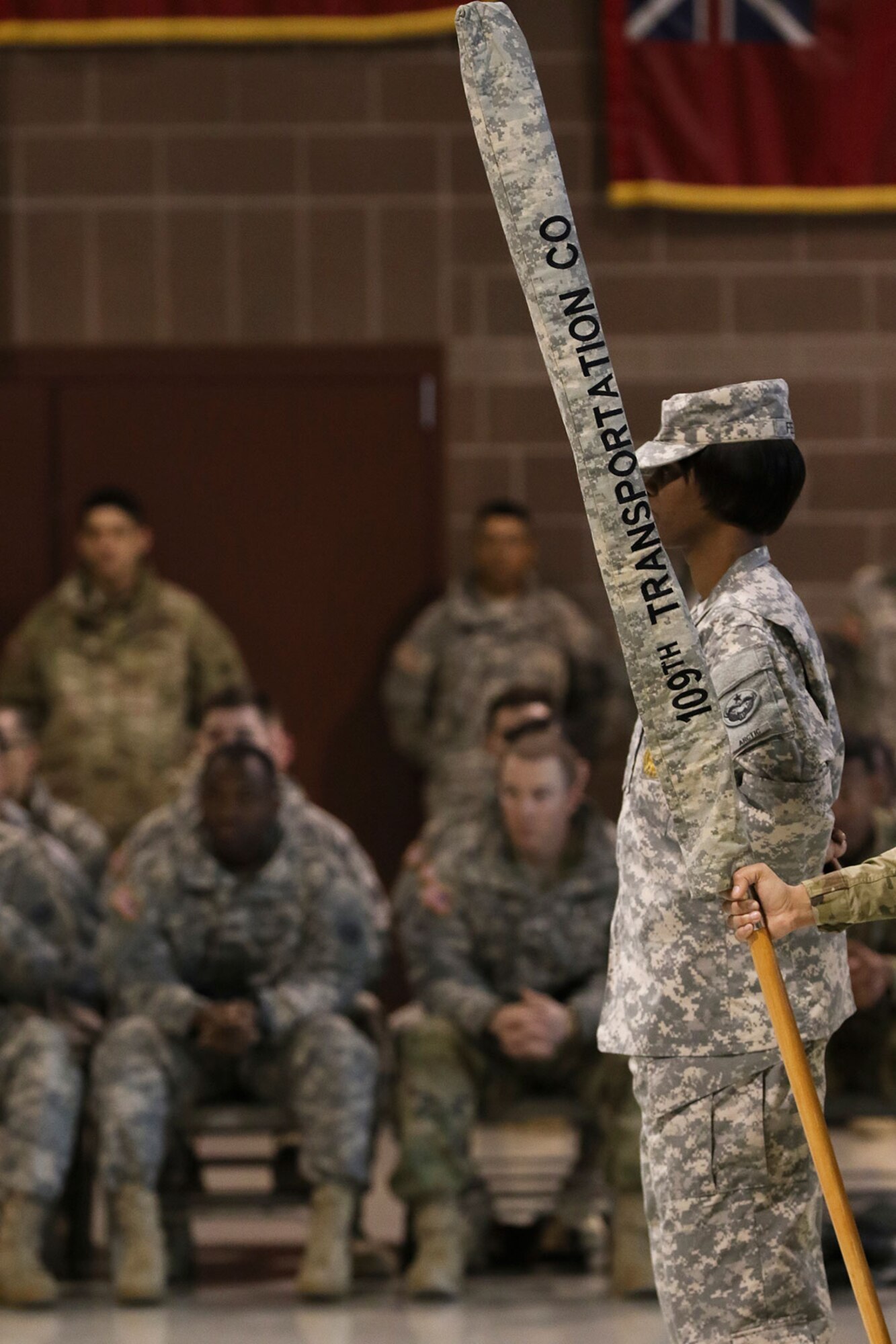 More than 100 U.S. Army Alaska Soldiers bid farewell to their family, friends and fellow Soldiers during the 109th Transportation Company's deployment ceremony March 10, 2016, at Joint Base Elmendorf-Richardson, Alaska. The unit is deploying to Kuwait, where they will be supporting the transportation needs of the U.S. and allied forces there. (U.S. Army Alaska/Sachel Harris)