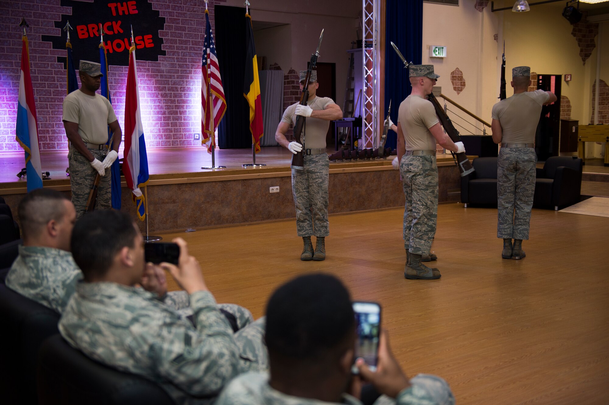 Members of the U.S. Air Force Honor Guard Drill Team perform for Spangdahlem Air Base honor guardsmen during training at Spangdahlem Air Base, Germany, March 16, 2016. The USAF Honor Guard conducted training with Spangdahlem and Ramstein Air Base honor guardmen during their visit. (U.S. Air Force photo by Staff Sgt. Christopher Ruano/Released)
