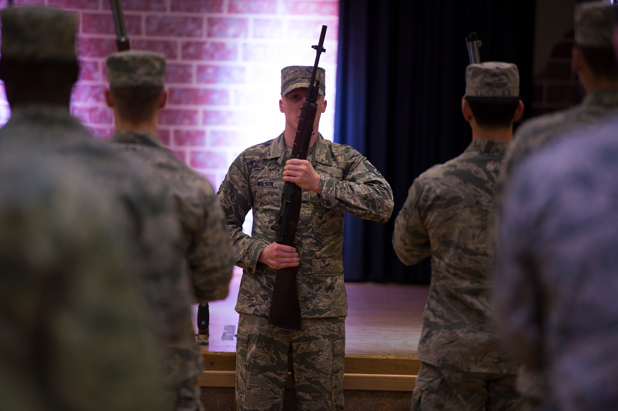 U.S. Air Force Alexander Wilson, U.S. Air Force Honor Guard drill team training NCO in charge, demonstrates the proper cadence of rifle movements during honor guard training at Spangdahlem Air Base, Germany, March 16, 2016. The USAF Honor Guard drill team is assigned at Joint Base Anacostia-Bolling and performs in the National Capital Region. (U.S. Air Force photo by Staff Sgt. Christopher Ruano/Released)
