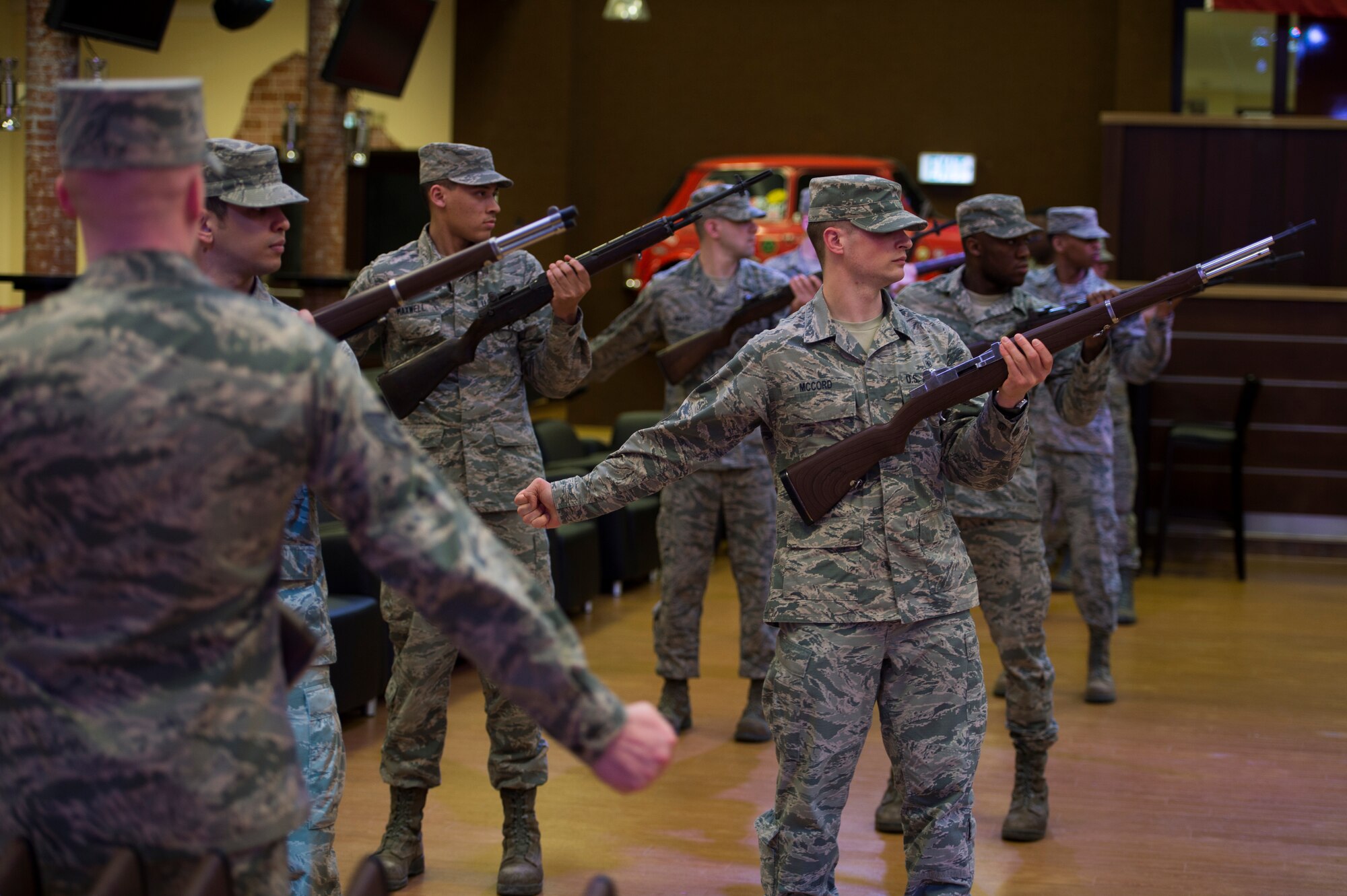 Members of the Spangdahlem Air Base honor guard perform firing drill movements during training at Spangdahlem Air Base, Germany, March 16, 2016. The honor guard firing party fires a succession of shots at military funerals to honor a deceased veteran. (U.S. Air Force photo by Staff Sgt. Christopher Ruano/Released)  

