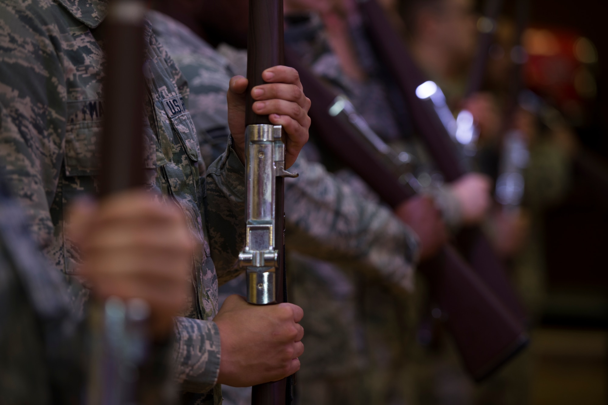 Spangdahlem Air Base honor guard members practice rifle movements during honor guard training at Spangdahlem Air Base, Germany, March 16, 2016. The base honor guard provides their services at special events, military funerals and ceremonies on and off base. (U.S. Air Force photo by Staff Sgt. Christopher Ruano/Released)

