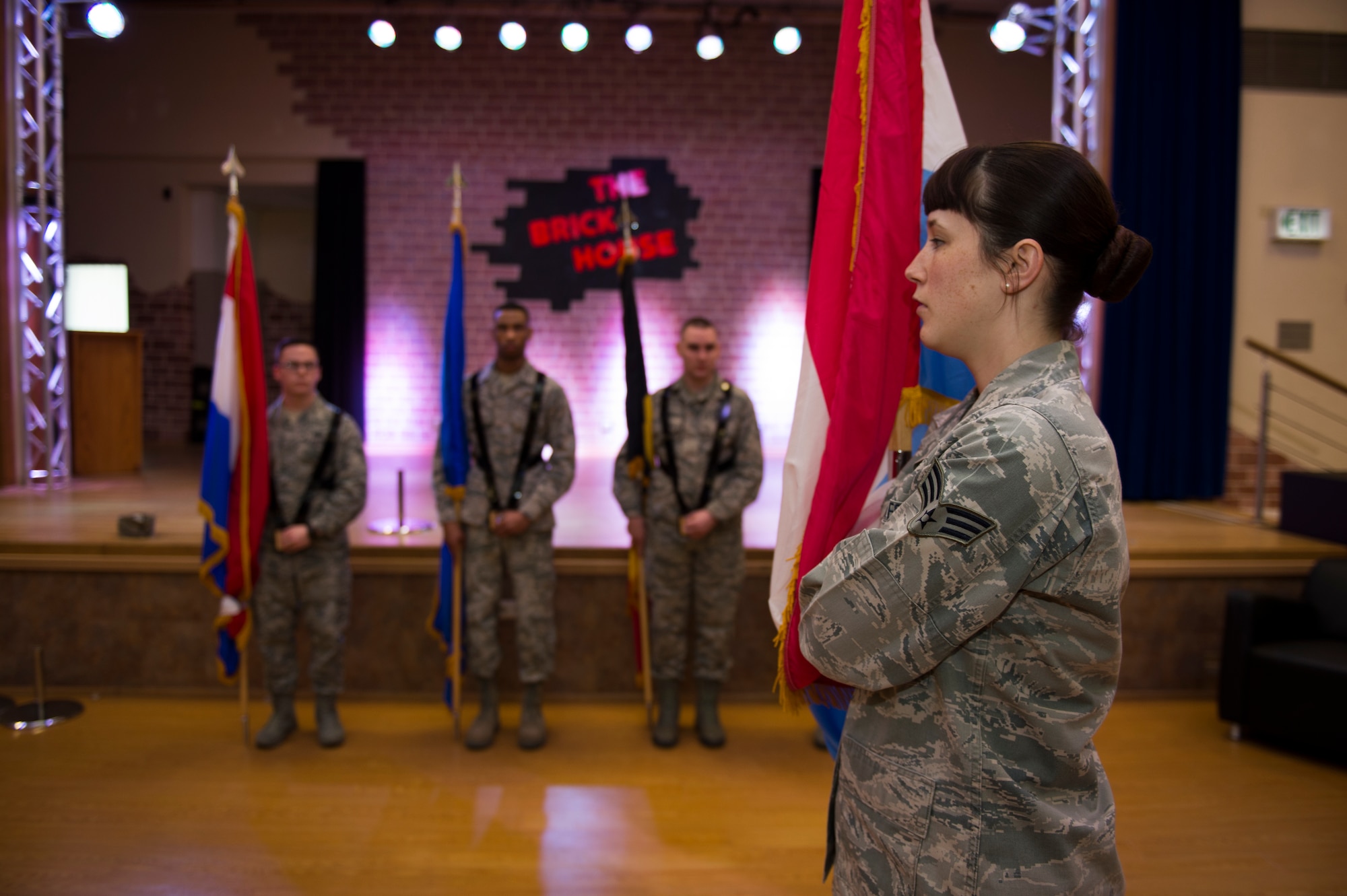 U.S. Air Force Senior Airman Amber Marcum, U.S. Air Force Honor Guard base honor guard program coordinator, demonstrates the proper carry of the guidon during honor guard training at Spangdahlem Air Base, Germany, March 16, 2016.  According to the USAF Honor Guard mission they represent Airmen to the American public and the world. (U.S. Air Force photo by Staff Sgt. Christopher Ruano/Released)