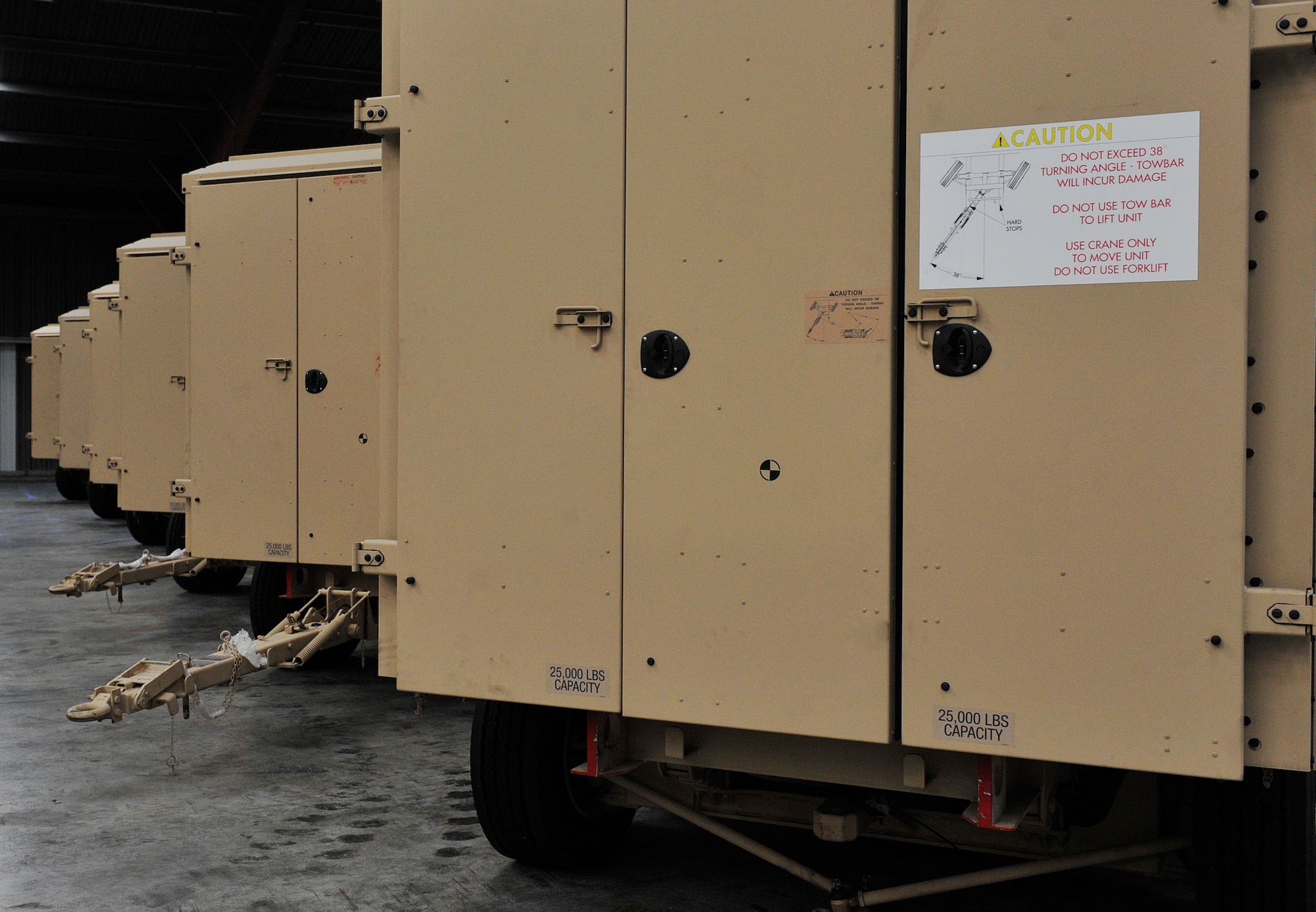 Storage trailers are parked in a warehouse at the Central Regional Storage Facility site March 3, 2016, at Sanem, Luxembourg. The 86th Materiel Maintenance Squadron stores military equipment that is constantly prepared to deploy at any moment. (U.S. Air Force photo/Airman 1st Class Larissa Greatwood)