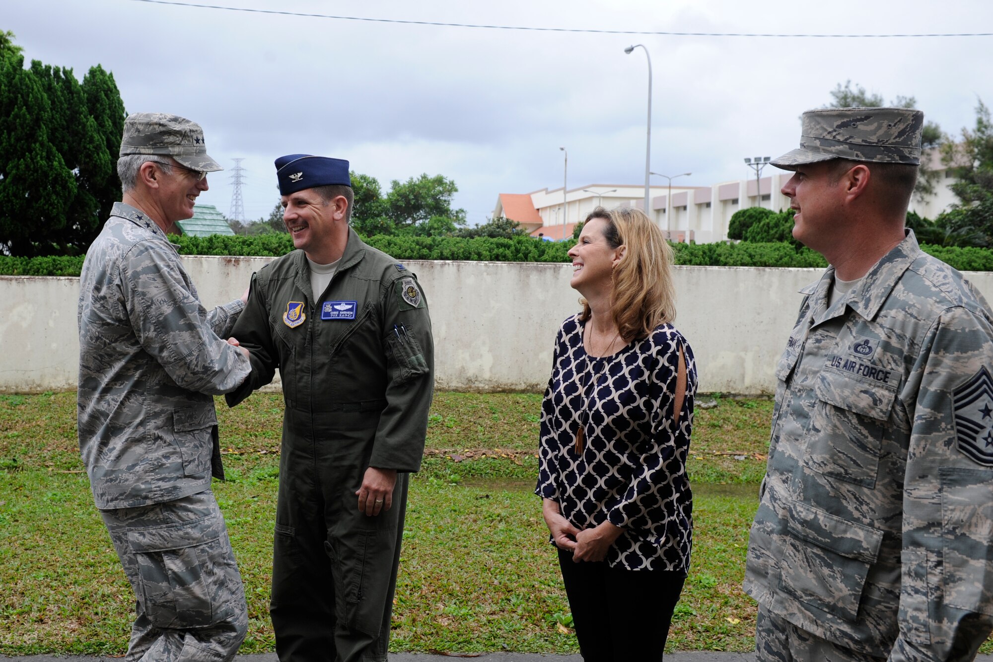 U.S. Air Force Gen. Paul Selva, Vice Chairman of the Joint Chiefs of Staff, greets Col. Christopher Amrhein, 18th Wing vice commander, his wife Cathy, and Chief Master Sgt. Charles Hoffman, 18th Wing command chief master sergeant, during the United Service Organization Spring Visit tour, March 14, 2016, at Kadena Air Base, Japan. Selva led the tour at Kadena for its second stop celebrating the USO's 75th Anniversary serving U.S. military members and families. (U.S. Air Force photo by Senior Airman Peter Reft)
