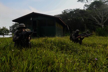 Guatemalan marines conduct squad-level training March 9, 2016, Guatemala, during a partnership with a U.S. Marine Security Cooperation Team. These teams of U.S. Marines are comprised of subject matter experts who provide partner nations in the Central American region with best practices for countering transnational criminal organizations. (U.S. Air Force photo by Staff Sgt. Westin Warburton/RELEASED)