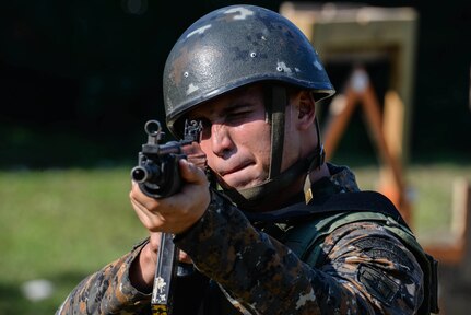 A Guatemalan Marine practices lining up his sights March 10, 2016, Guatemala, prior to a live-fire exercise. The Guatemalan marines took part in a four week training course to hone their skills in basic infantry movements and urban operations with the intent of helping them combat drug trafficking organizations. (U.S. Air Force photo by Staff Sgt. Westin Warburton/RELEASED)