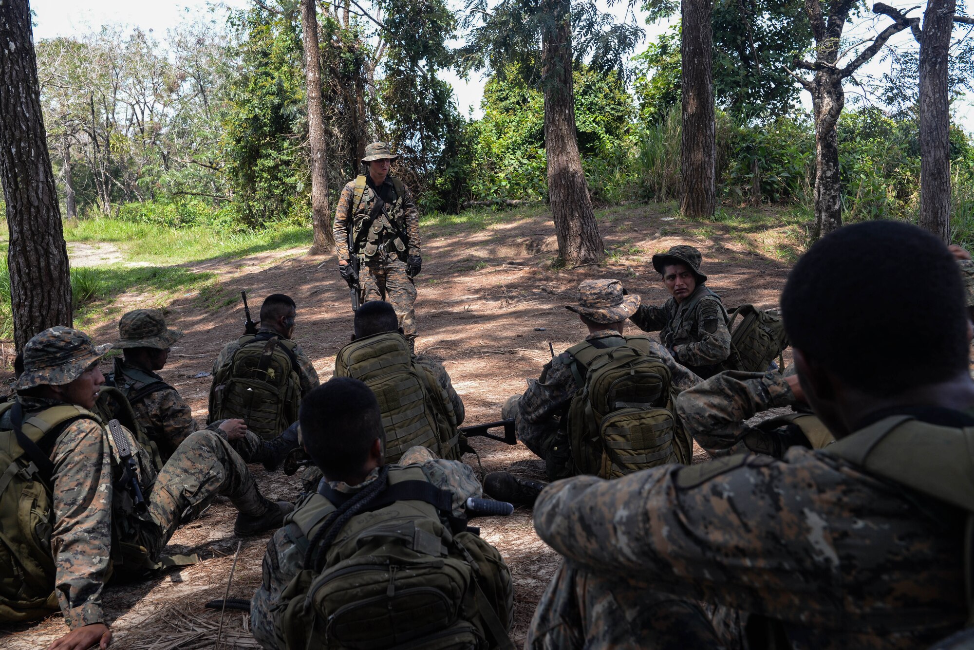 Guatemalan marines conduct a brief March 9, 2016, Guatemala, as part of an exercise which tested their ability to navigate to an objective and operate in an urban environment. The exercise was a final evaluation in course requested by the Guatemalans to provide training and real-life simulations for the Guatemalans marines. (U.S. Air Force photo by Staff Sgt. Westin Warburton/RELEASED)