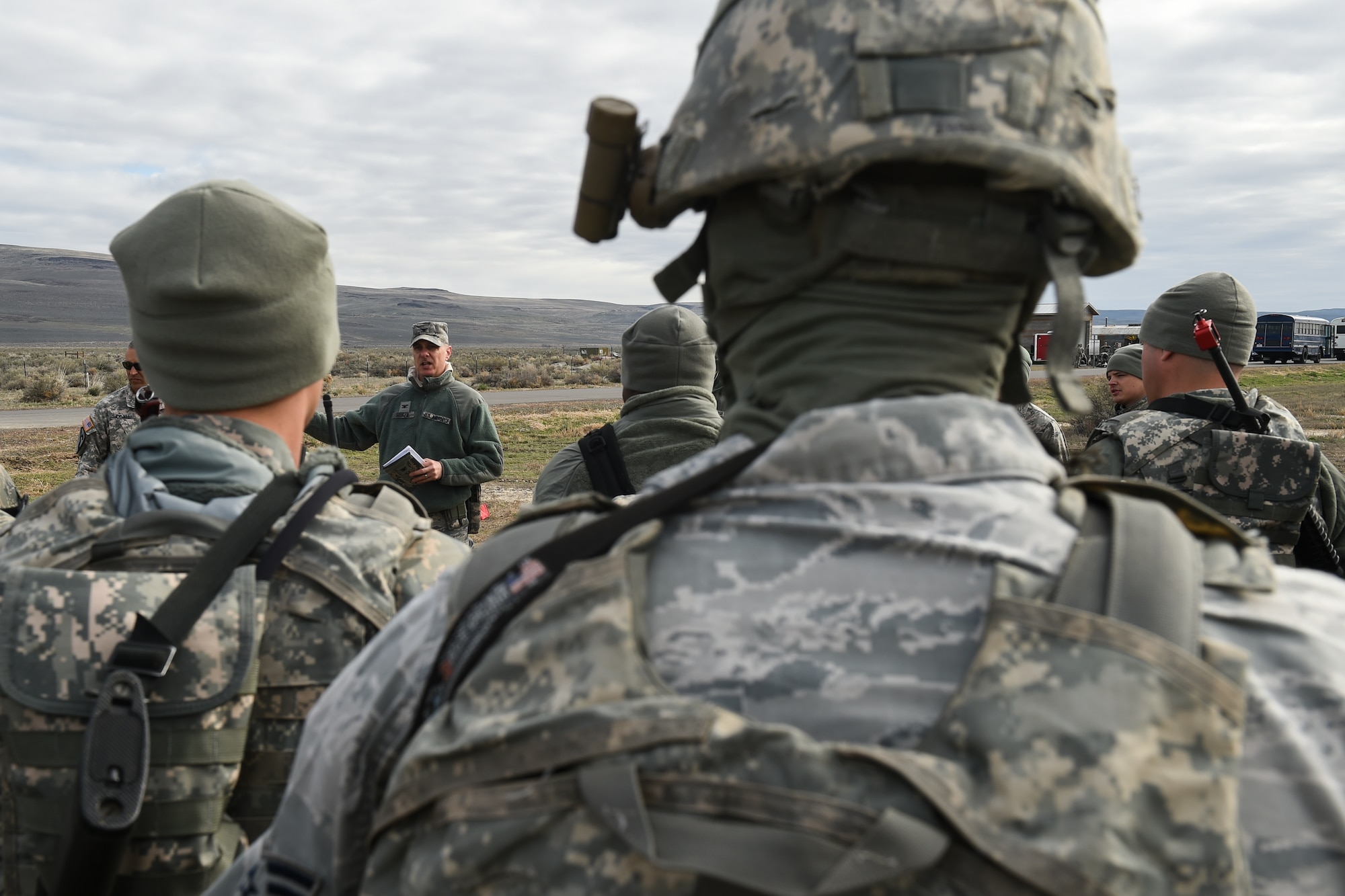 Col. Thomas Seeker, 821st Contingency Response Group deputy commander and the Joint Task Force-Port Opening commander briefs Airmen, Soldiers and officials from the Defense Logistics Agency during Exercise Turbo Distribution 16-02, March 15, 2016, at Amedee Army Airfield, Calif. Turbo Distribution is used to evaluate mobility operations and expeditionary combat support. Unlike traditional, simulation based exercises, TD provides a dynamic venue with scenarios designed to challenge participants executing complex operations in a deployed environment. (U.S. Air Force photo by Staff Sgt. Robert Hicks/Released)