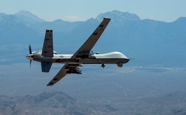 An MQ-9 Reaper remotely piloted aircraft performs aerial maneuvers over Creech Air Force Base, Nev., June 25, 2015. The MQ-9 Reaper is an armed, multi-mission, medium-altitude, long-endurance remotely piloted aircraft that is employed primarily as an intelligence-collection asset and secondarily against dynamic execution targets. (U.S. Air Force photo by Senior Airman Cory D. Payne/Not Reviewed)