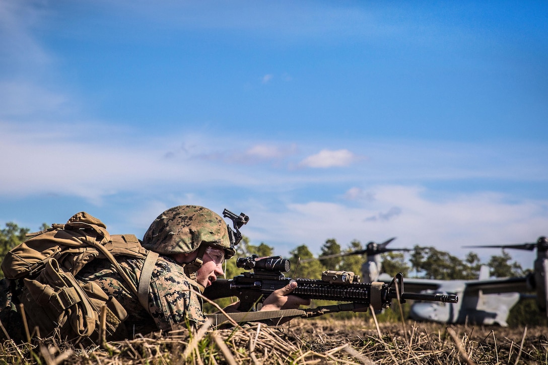 Marine Corps Lance Cpl. Ronald Hester provides security during a casualty evacuation exercise at landing zone Penguin on Camp Lejeune, N.C., March 10, 2016. Hester is a combat engineer assigned to the 2nd Combat Engineer Battalion. Marine Corps photo by Lance Cpl. Erick Galera