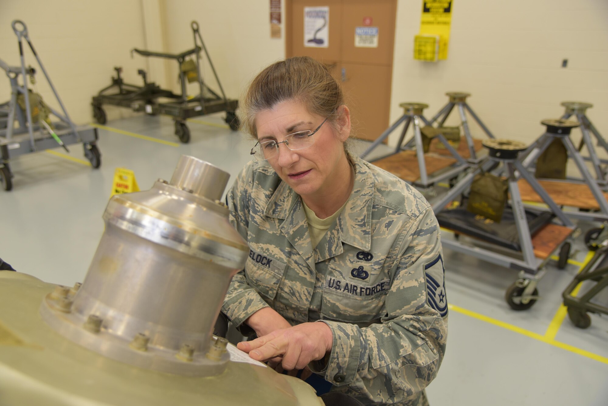 Master Sgt. Katherine Wheelock, 403rd Maintenance Group engine manager, conducts an inventory verifying the serial number on a C-130J Super Hercules aircraft propeller Feb. 5, 2016, at Keesler Air Force Base, Mississippi. Wheelock joined the Air Force in 1979, got out in 1986, and joined the Air Force Reserve's 403rd Wing in 1996 and became an Air Reserve Technician in 1998. (U.S. Air Force photo/Maj. Marnee A.C. Losurdo)