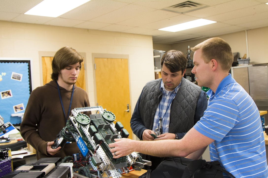 Charleston District's Brad Ryczko, mechanical technician, recently volunteered to help the robotics team at West Ashley High School prepare for an upcoming competition by giving them advice on ways to improve their robots. The school says his dedication to their team will help them win the championship.