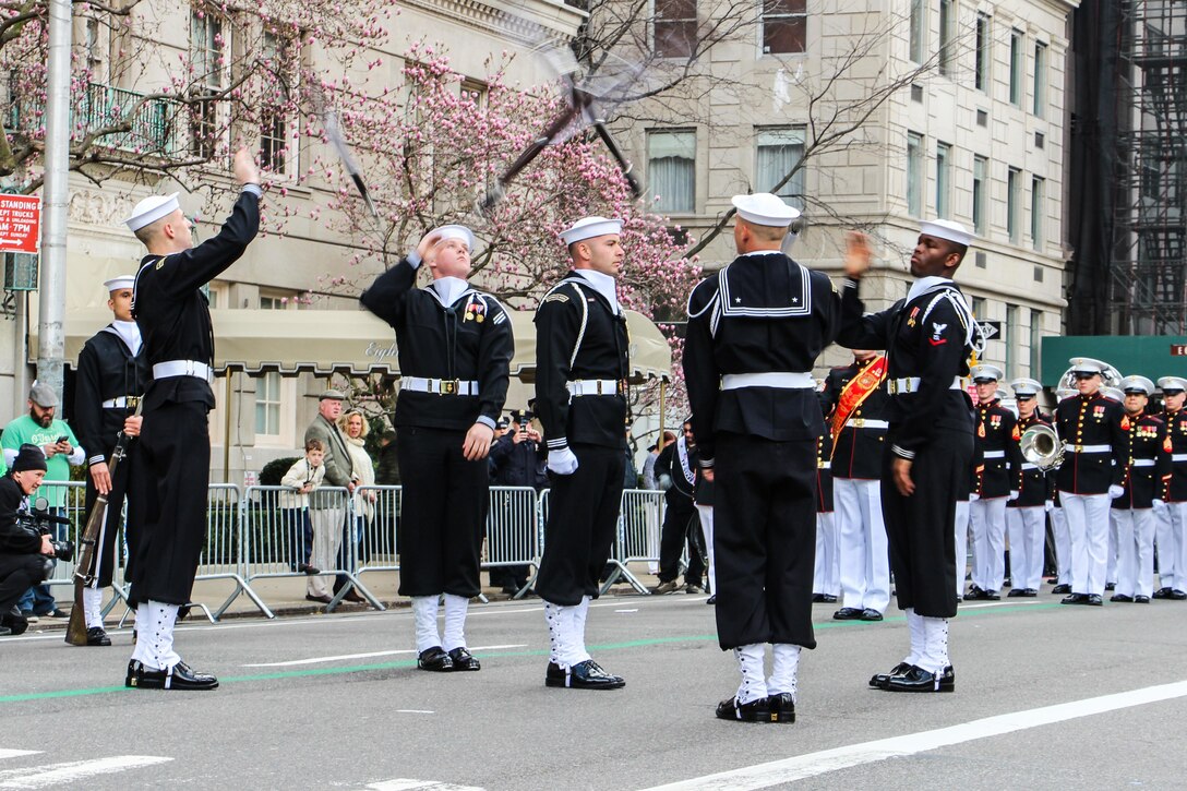 Sailors assigned to the Navy Ceremonial Guard perform a rifle drill during the 255th St. Patrick's Day Parade in New York City, March 17, 2016. Navy photo by Lt. Matthew Stroup