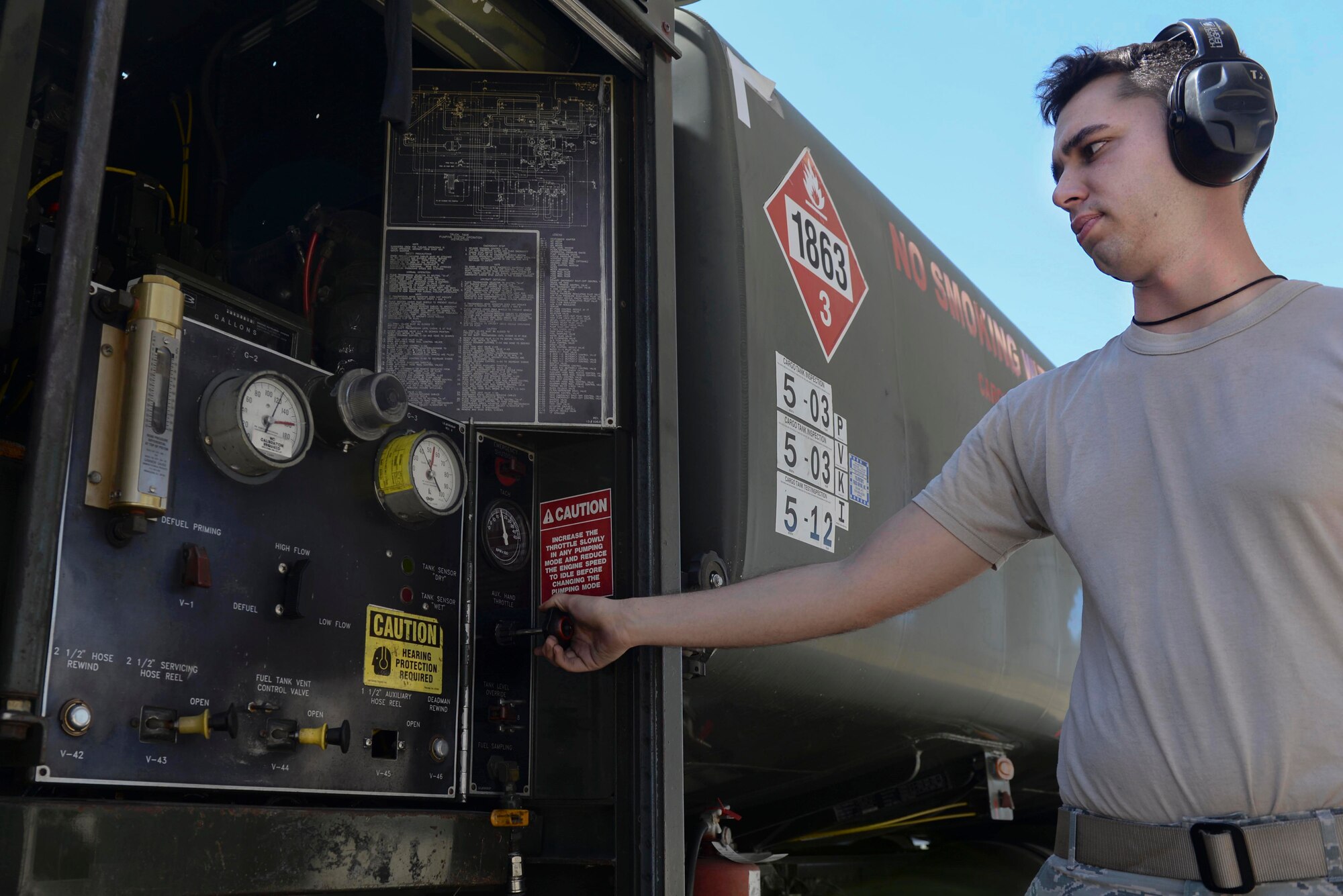 Airman 1st Class Christopher Lansville, 4th Logistics Readiness Squadron petroleum, oil, and lubricants fuels distribution specialist, monitors pressure gages while refueling an F-15E Strike Eagle, March 16, 2016, at Seymour Johnson Air Force Base, North Carolina. After each flight, thousands of gallons of fuel fill the jets to ready them for the next flight. (U.S. Air Force photo/Airman 1st Class Ashley Williamson)