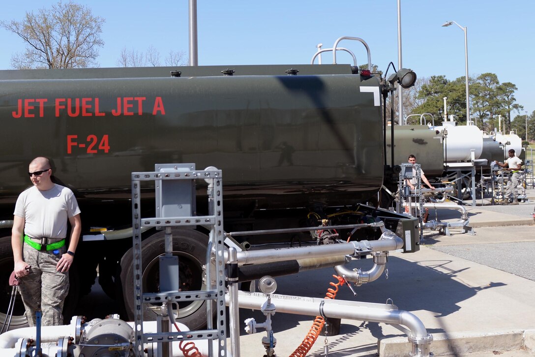 Petroleum, oil, and lubricants fuels distribution specialists from the 4th Logistics Readiness Squadron refuel R-11 refueling trucks, March 16, 2016, at Seymour Johnson Air Force Base, North Carolina. POL distributes approximately 1 million gallons of fuel per week for the 4th Operations Group F-15E Strike Eagles to maintain their flight schedule. (U.S. Air Force photo/Airman 1st Class Ashley Williamson)