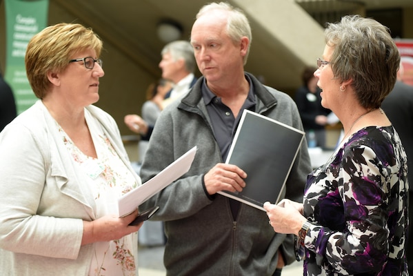 Valerie Carlton, U.S. Army Corps of Engineers Nashville District Contracting chief, speaks with Tina Reese, Avanti Environmental Group, and Gary Reese, AEG, during the 5th Annual Small Business Forum at Tennessee State University in Nashville, Tenn., March 17, 2016.