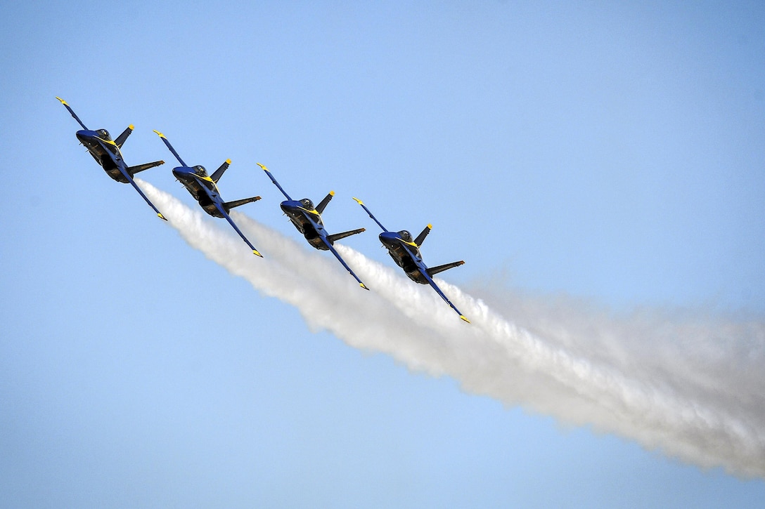 The Blue Angels, the Navy's flight demonstration squadron, perform a parade maneuver during the Naval Air Facility El Centro Airshow in El Centro, Calif., March 12, 2016. The squadron, celebrating its 70th anniversary, is scheduled to perform 65 demonstrations at 34 locations across the country in 2016. Navy photo by Petty Officer 2nd Class Daniel M. Young
