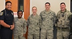 JBSA 502d Security Forces Squadron personnel (From left to right) Officer Christopher L. Barker Jr., Security Assistant, Senior Airman Adrienne Barriere, Senior Airman S. Elizabeth Aguilar, Airman 1st Class Sean M. Jenkins, Airman 1st Class Quytin Lewis