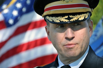 Col. Adam Roth, deputy chief of staff and director of Public Works for the U.S. Army Reserve's 99th Regional Support Command, prepares to give opening remarks during a ceremony March 18 at the Princeton Cemetery in Princeton, N.J., to honor President Grover Cleveland.