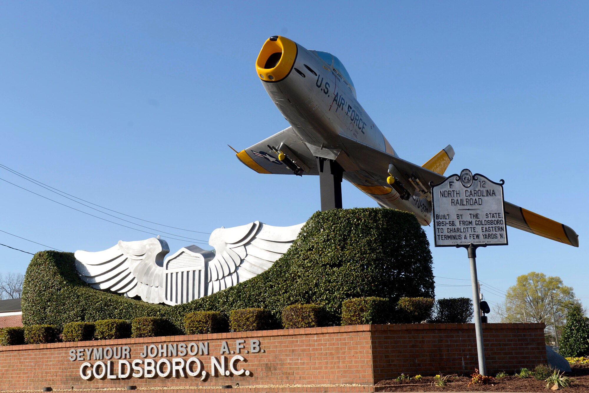 A restored F-86 Sabre is re-dedicated during a ceremony, March 17, 2016, in Goldsboro, North Carolina. The plane was originally placed at the Goldsboro police and fire complex, before refurbishment and finally placed downtown for the community. (U.S. Air Force photo/Airman 1st Class Ashley Williamson)