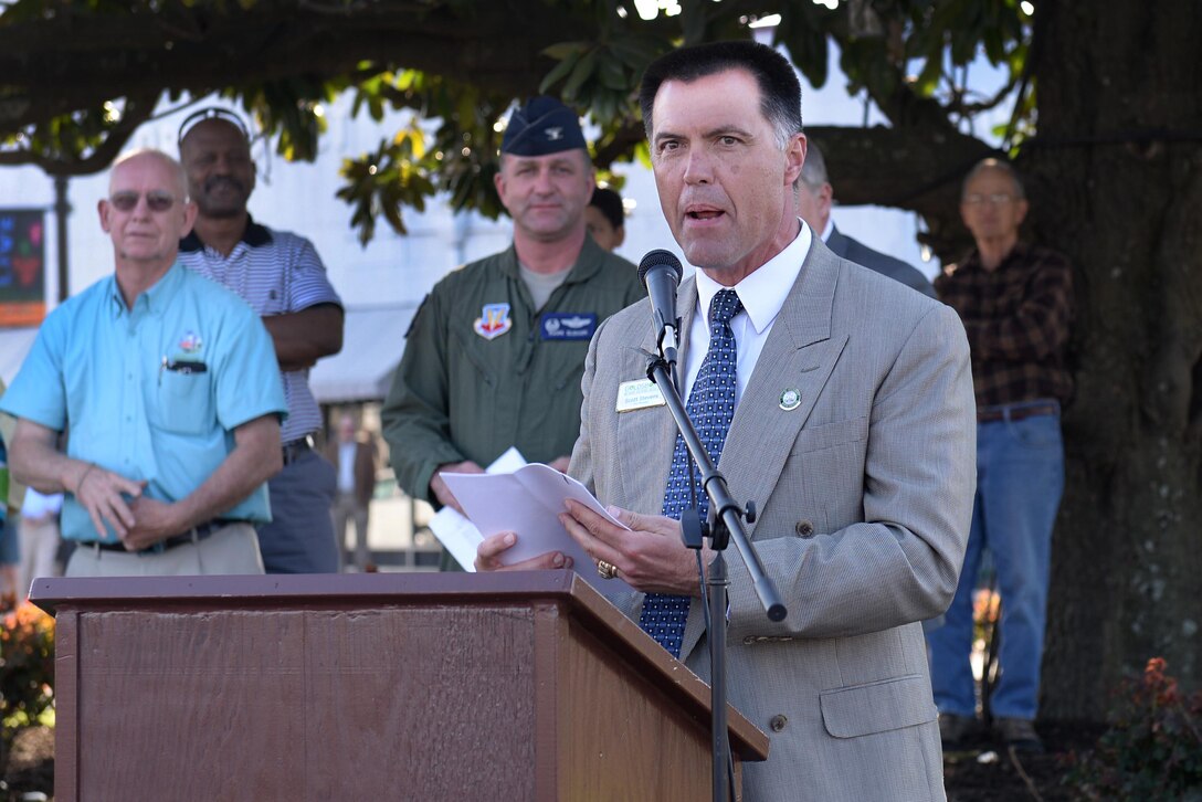 Scott Stevens, City Manager for Goldsboro, North Carolina, addresses the crowd March 17, 2016, during an F-86 Sabre re-dedication ceremony downtown. Seymour Johnson Air Force Base worked in conjunction with the city to transport the aircraft from its original location, fully restore and return it to the current display area. (U.S. Air Force photo/Airman 1st Class Ashley Williamson)