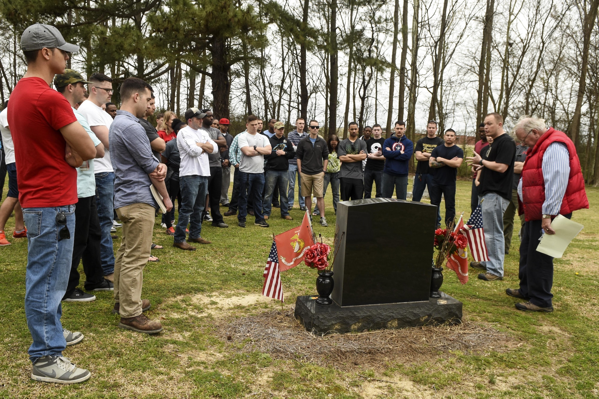 Airmen from Airman Leadership School class 16-C gather around the grave of the youngest American killed in the Vietnam War, Private First Class Dan Bullock, March 12, 2016, in Goldsboro, North Carolina. Bullock was killed in action at the age of 15 while serving in the U.S. Marine Corps. (U.S. Air Force photo/Airman Shawna L. Keyes)