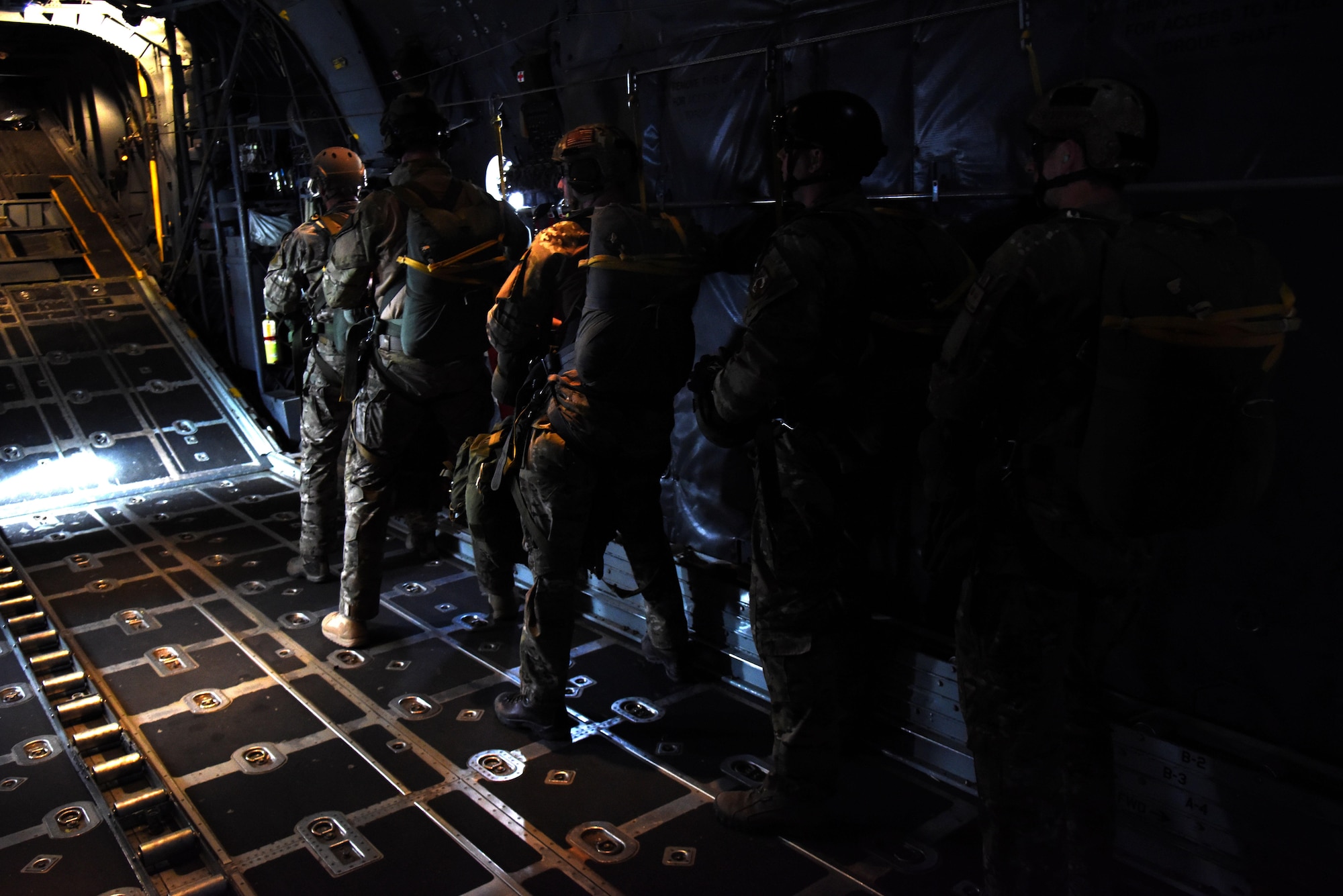Survival, evasion, resistance and escape specialists prepare to jump from a C-130 Hercules March 3, 2016 as part of Red Flag 16-2 near Nellis Air Force Base, Nevada. More than 10 specialists participated in the two-week exercise which aimed to advance operations effectiveness for worldwide contingencies. (U.S. Air Force photo/Staff Sgt. Chuck Broadway)