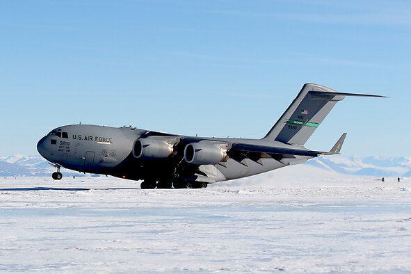 A C-17 Globemaster III aircraft out of Joint Base Lewis-McChord, Washington, lands on Pegasus Runway in Antarctica during the 2015 Operation Deep Freeze Season. Aircrews from the 446th and 62nd Airlift Wings from JBLM performed night-vision goggle landings during the Austral Winter. (Courtesy photo)