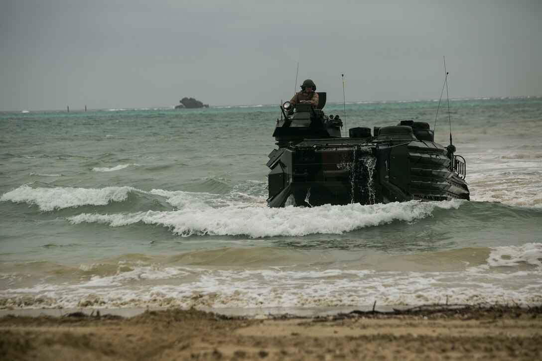 Marines and their loved ones experienced an Amphibious Assault Vehicle “splash” during a Jane Wayne event on Camp Schwab, Okinawa, Japan, March 18, 2016. These events provide a good bonding opportunity while giving Marine’s family members a closer look at their day-to-day lives. The AAVs are with Combat Assault Battalion, 3rd Marine Division, III Marine Expeditionary Force. (U.S. Marine Corps photo by Cpl. William Hester/ Released)