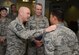 Chief Master Sgt. David Staton, command chief of Air Education and Training Command, left, and Lt. Gen. Darryl Roberson, AETC commander, speak to Senior Airman Samuel Hahn, 47th Medical Group Public Health technician during a base tour at Laughlin Air Force Base, Texas, March 16, 2016. During the visit to Laughlin, Roberson and Staton toured the medical facility and were briefed on programs operated by members of the 47th Medical Group. (U.S. Air Force photo by Airman 1st Class Brandon May)