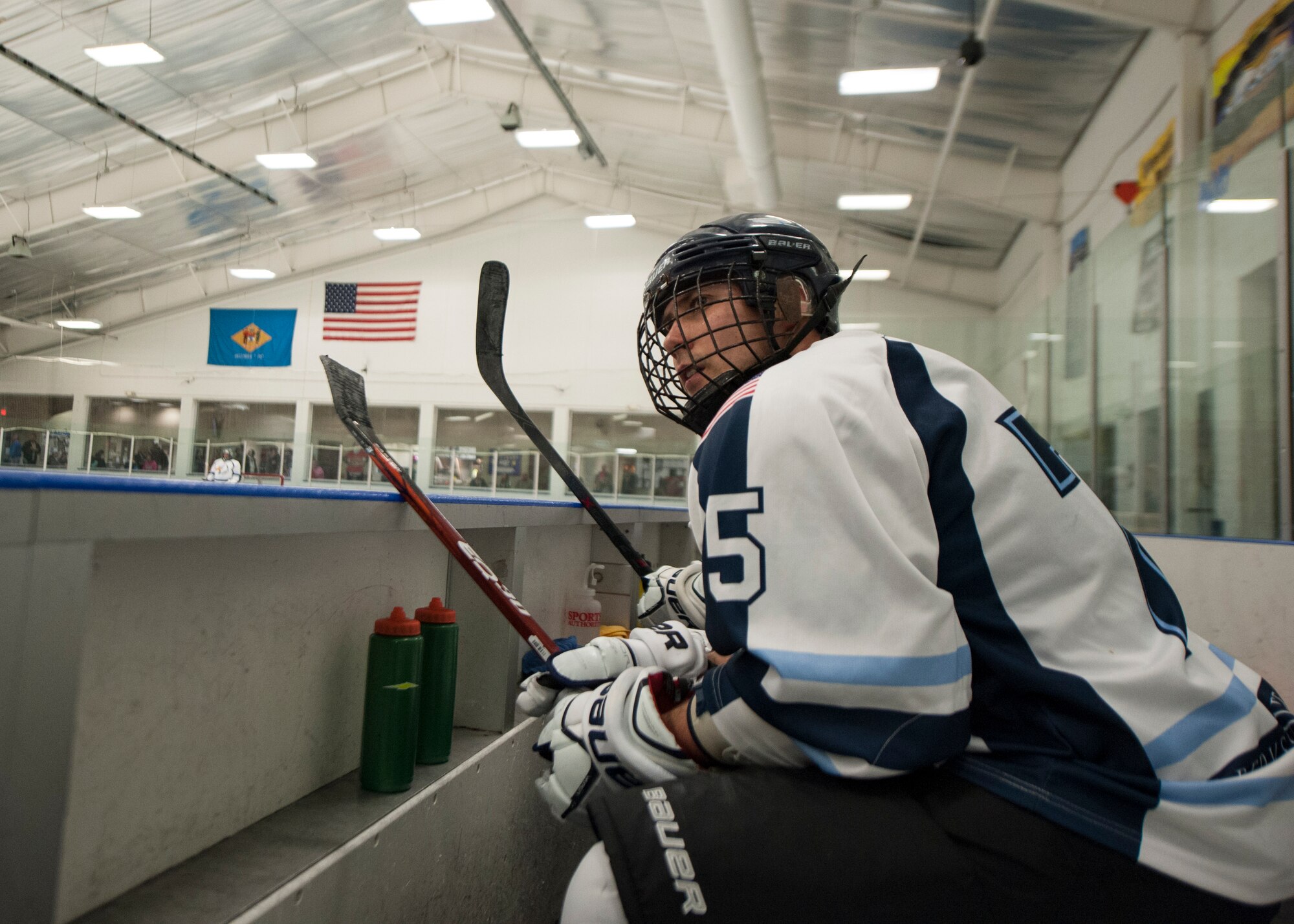 Mike Roth, Dover Eagles center, watches play while sitting on his team’s bench during a charity hockey game March 13, 2016, at the Centre Ice Rink in Harrington, Del. Roth is assigned to the 436th Security Forces Squadron. (U.S. Air Force photo/Senior Airman Zachary Cacicia)