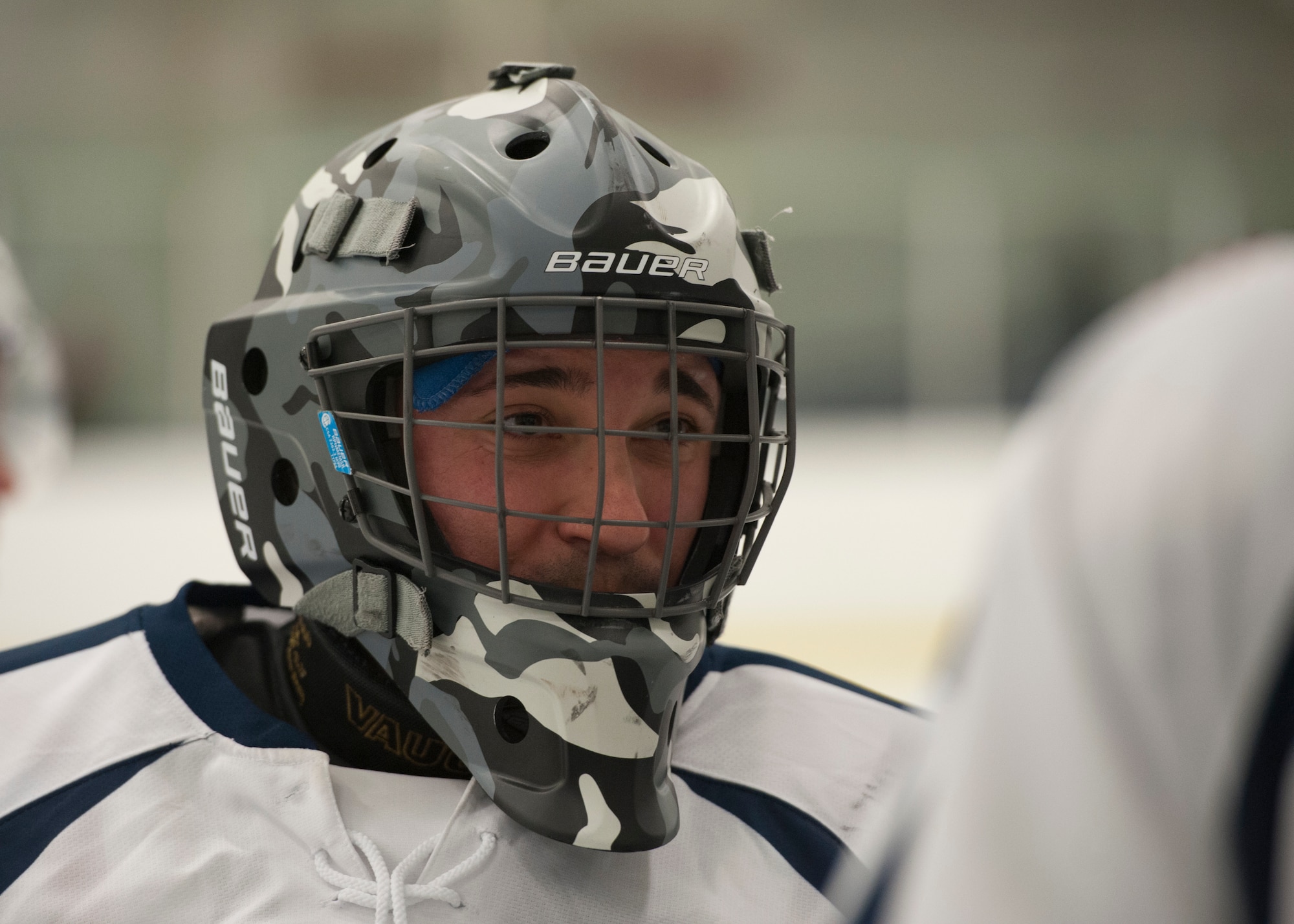 Jeff Kach, Dover Eagles goalie, gathers with his teammates on their bench during the first intermission at a charity hockey game March 13, 2016, at the Centre Ice Rink in Harrington, Del. Kach gave up 9 goals to the Fraternal Order of Police Lodge 15 hockey team. (U.S. Air Force photo/Senior Airman Zachary Cacicia)