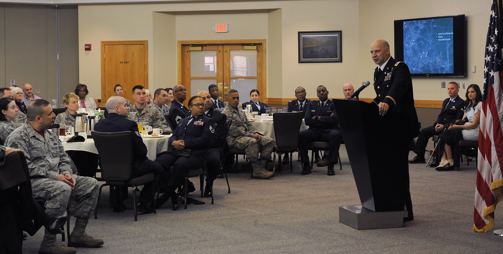 U.S. Army Col. Douglas Mastriano, an instructor at the U.S. Army War College, Department of Military Strategy, Planning and Operations, speaks to members of Team Whiteman during the National Prayer Breakfast at Whiteman Air Force Base, Mo., March 11, 2016. Mastriano shared a story about a soldier during World War I who changed the course of history and spoke about why every life matters. (U.S. Air Force photo by Airman 1st Class Michaela R. Slanchik)