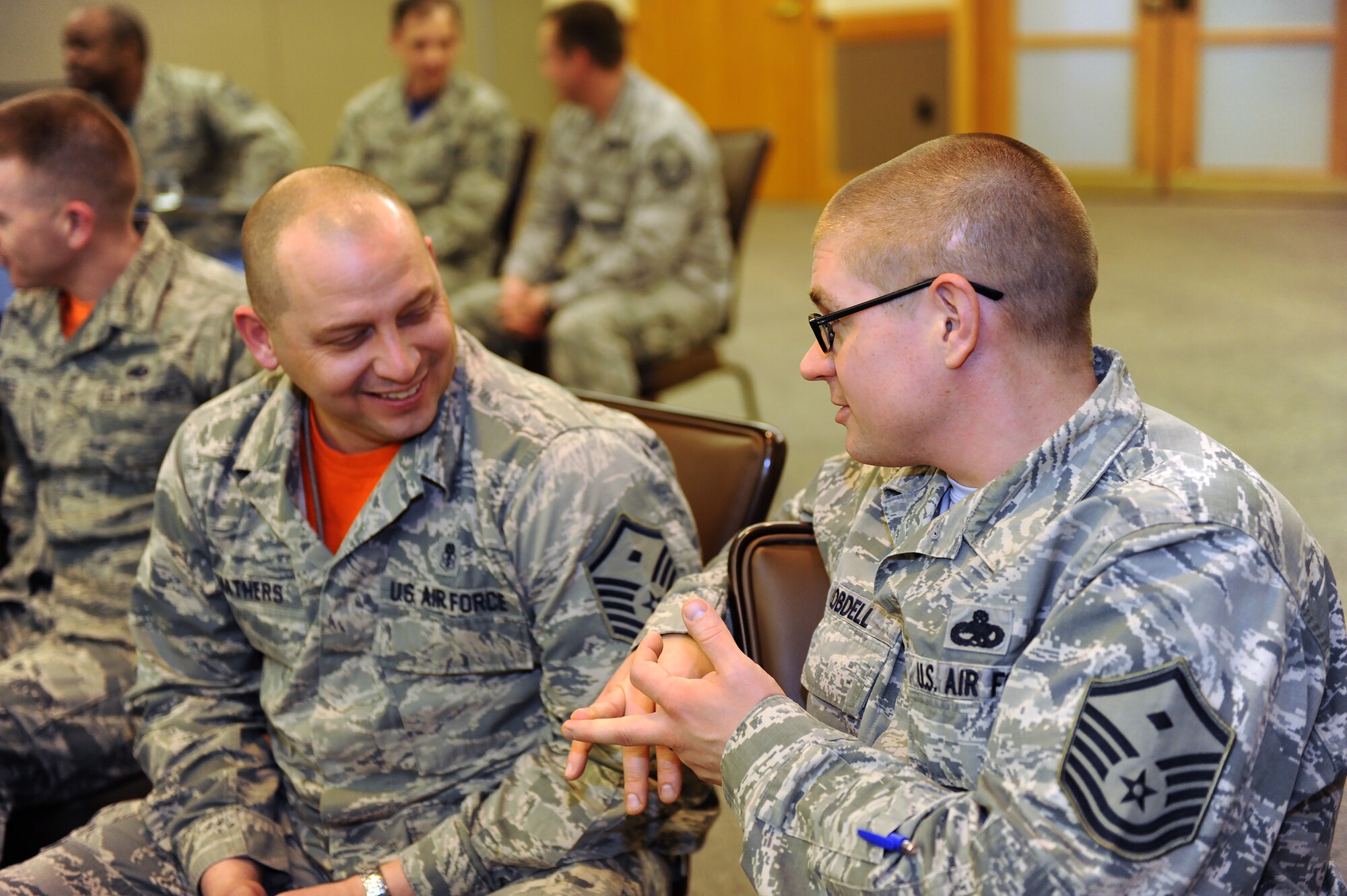 U.S. Air Force Master Sgt. Michael Mathers, left, and Master Sgt. Corey Lobdell, both Whiteman first sergeants, practice a listening and communication skills exercise during Profession of Arms Center of Excellence (PACE) training at Whiteman Air Force Base, Mo., March 4, 2016. PACE was designed to teach leaders how to embody a higher level of professionalism and communication to lead more effectively. (U.S. Air Force photo by Airman 1st Class Michaela R. Slanchik)