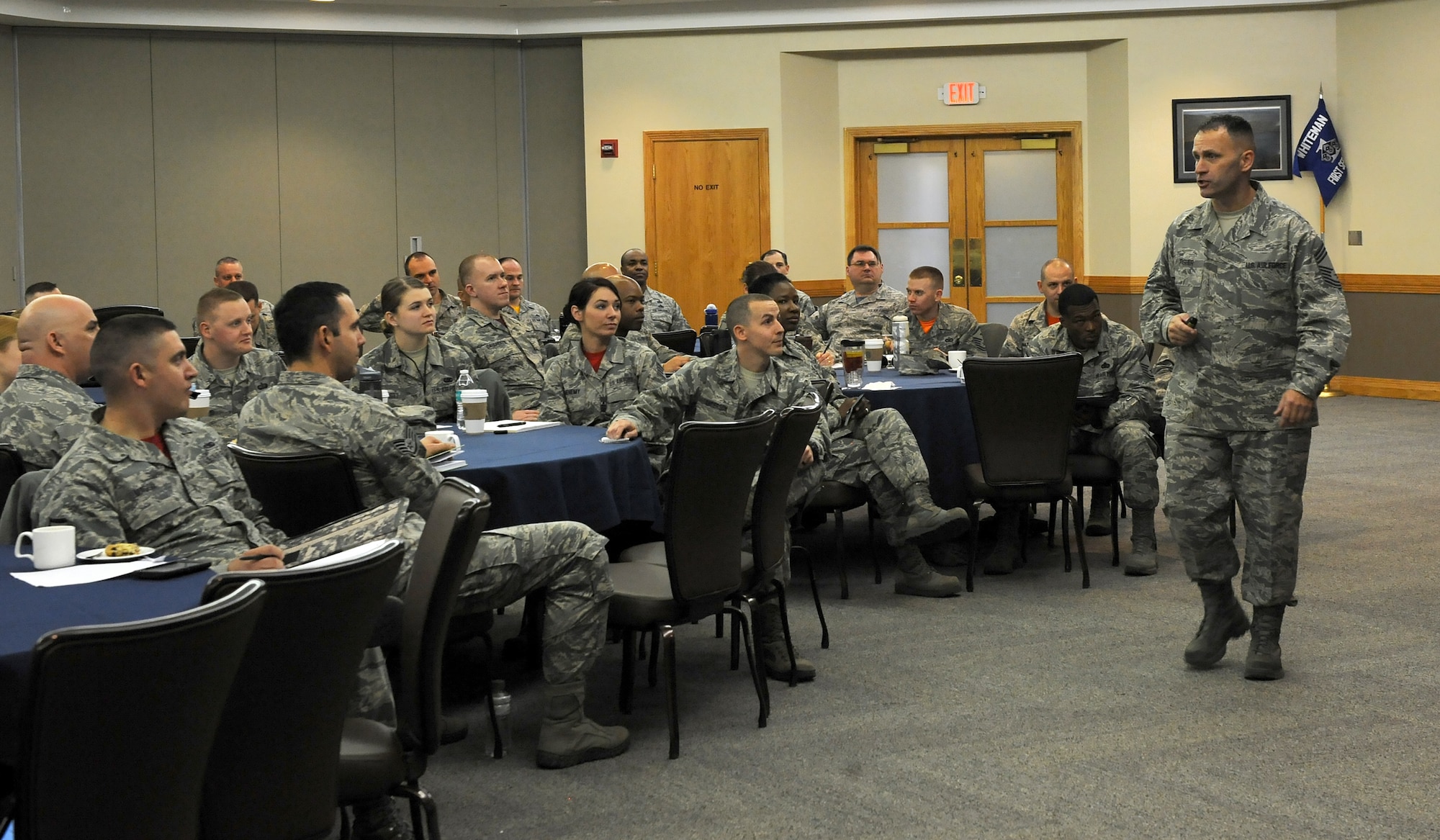 U.S. Air Force Chief Master Sgt. Anthony Fisher, the superintendent of Profession of Arms Center of Excellence (PACE), briefs senior enlisted leaders during PACE training at Whiteman Air Force Base, Mo., March 4, 2016. The training included tips on bridging the Air Force core values and its mission to accomplish a higher level of professionalism through trust, loyalty and commitment. (U.S. Air Force photo by Airman 1st Class Michaela R. Slanchik)