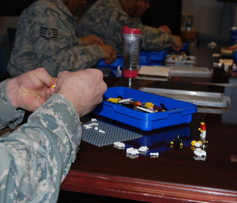 PETERSON AIR FORCE BASE, Colo. – Using LEGO bricks to instill resiliency skills was the purpose of a training session March 9, 2016 at Peterson Air Force Base. Kelly Reddin, LEGO Education global trainer was on hand to demonstrate how to use the popular toy bricks as a tool in resilience training. (U.S. Air Force photo by Dave Smith)