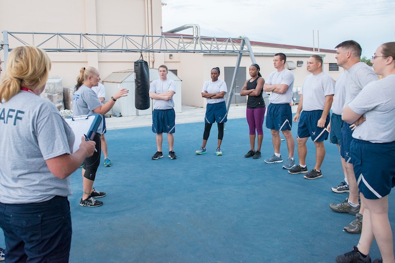 Tammy Shelley, 45th Space Wing fitness and sports manager, briefs members participating in the 1946 Army Physical Fitness Test Challenge March 18, 2016, at the Patrick Air Force Base fitness center, Fla. The challenge served as a tribute to the first women who entered the military, which were required to complete the physical fitness test in order to join. (U.S. Air Force photo by Matthew Jurgens/released)