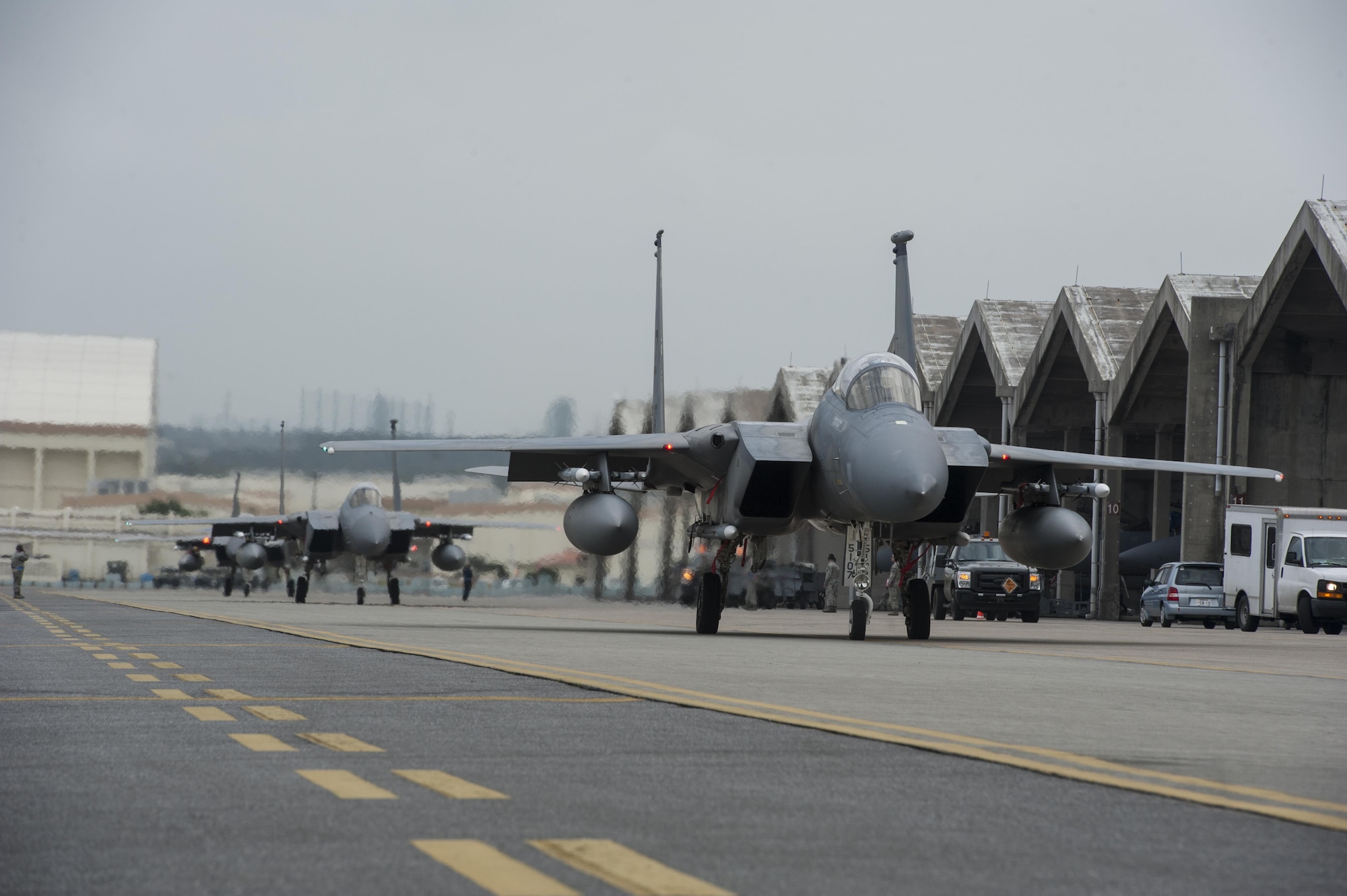 F-15 Eagles from Kadena’s 44th Fighter Squadron taxi to the runway March 18, 2016, at Kadena Air Base, Japan. Members of the 44th FS participated in training to demonstrate Kadena’s air superiority and wartime readiness. (U.S. Air Force photo by Airman 1st Class Lynette M. Rolen) 