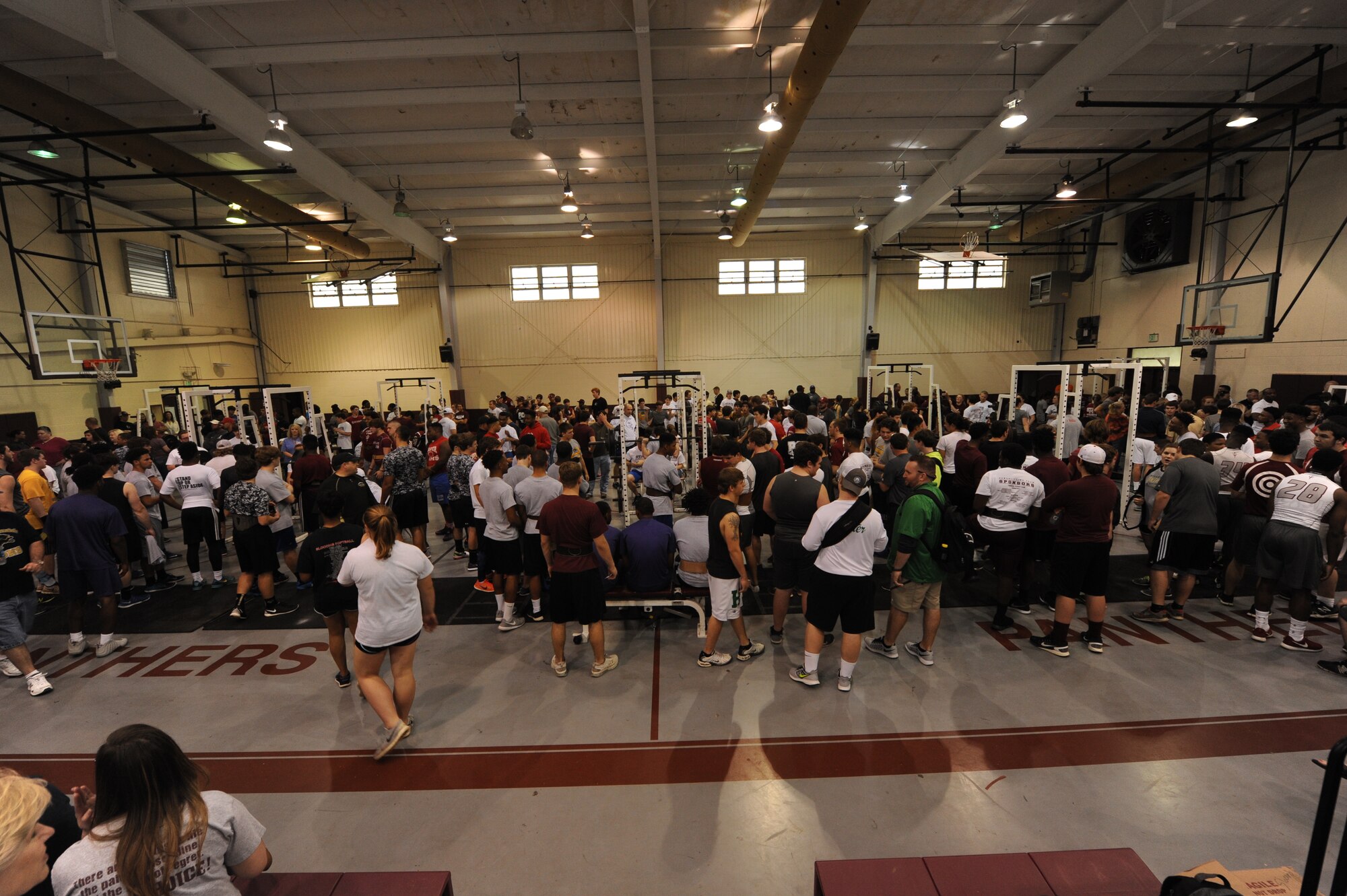 Athletes and volunteers crowd the Elmore County High School gym during the Alabama State Powerlifting Championships March 12, 2016, at Eclectic, Alabama. The championship had a total of 250 participants. (U.S. Air Force photo by Airman 1st Class Alexa Culbert)