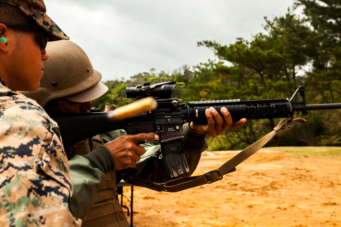 David Lucar fires an M16-A4 service rifle at Camp Schwab, Okinawa, Japan March 18, 2016. Lucar was able to experience dynamic facets of life in the Marine Corps. This included an Amphibious Assault Vehicle raid, firing the M9 service pistol, firing the M240B medium machine gun, wearing flak jackets with Kevlar helmets and eating packaged military rations. Lucar is an Okinawa resident and the uncle of a Marine with Combat Assault Battalion, 3rd Marine Division, III Marine Expeditionary Force. 