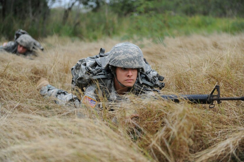 Sgt. Gabriela Echevarria, 276th Maintenance Company, secures the perimeter during a MEDEVAC exercise at the 1st MSC Best Warrior Competition on Camp Santiago, Puerto Rico, March 15.