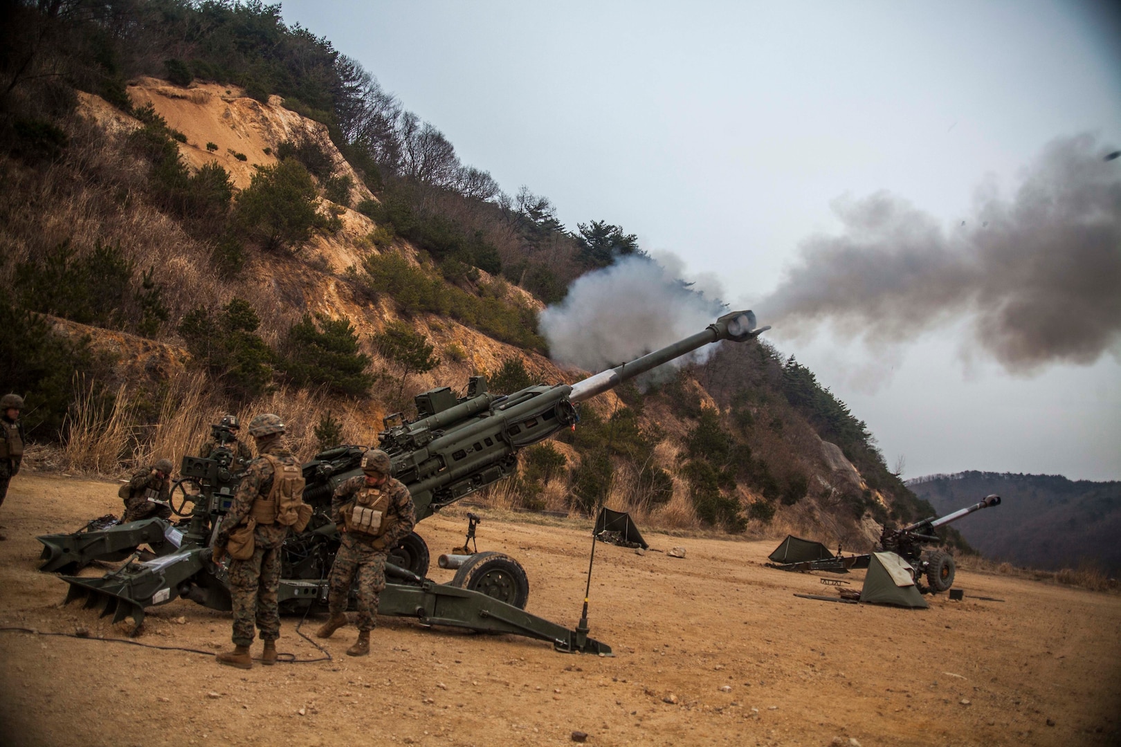 U.S. Marines with Golf Battery, Battalion Landing Team 1st Battalion, 5th Marines, 31st Marine Expeditionary Unit, fire their M777A2 lightweight 155 mm howitzer at Sanseori, South Korea, as part of Exercise Ssang Yong 16, March 15, 2016. Ssang Yong is a biennial combined amphibious exercise conducted by U.S. forces with the Republic of Korea Navy and Marine Corps, Australian Army and Royal New Zealand Army forces in order to strengthen interoperability and working relationships across a wide range of military operations. The Marines and sailors of the 31st MEU are currently deployed to Korea as part of their spring deployment of the Asia-Pacific region. (U.S. Marine Corps Photo by Gunnery Sgt. Ismael Pena/Released)