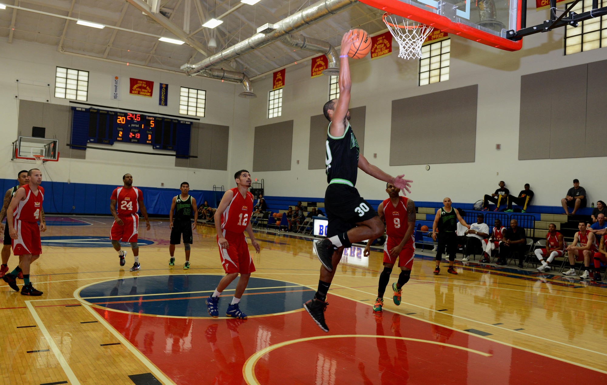The first games of the March Madness tournament kicks off at the Coral Reef Fitness Center March 19, 2016, on Andersen Air Force Base, Guam. The Andersen Bombers defeated the Chamorri Warriors with a score of 102-30 during the first game of the men’s division in the tournament. (U.S. Air Force photo/Airman 1st Class Arielle Vasquez)