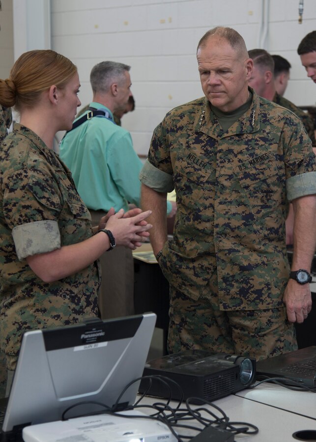 A Marine with U.S. Marine Corps Forces, Special Operations Command (MARSOC), briefs Commandant of the Marine Corps Gen. Robert B. Neller on one of the many capabilites critical skills operators have available for them for reviewing data for upcoming missions, during his visit at Stone Bay aboard Marine Corps Base Camp Lejeune, N.C., March 17, 2016.