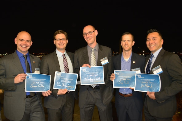 Two teams of Air Command and Staff College students took top honors at the Atlantic Council Cyber 9/12 Student Challenge in Washington, D.C., March 11-12. The Air University students competed against civilian and military teams from across the country, to include teams from Brown University, Harvard University, U.S. Naval Academy, Columbia University, and National Defense University. (Courtesy photo)
