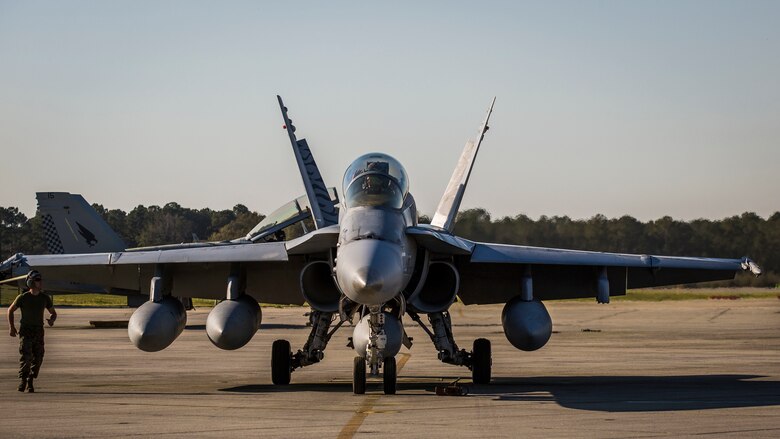 An F/A-18D Hornet returns to Marine Corps Air Station Beaufort, South Carolina, March 15, 2016. Marine All-Weather Fighter Attack Squadron 224 has been deployed to the Western Pacific since October 2015 as part of the Unit Deployment Program. The Hornet is with VMFA(AW)-224.