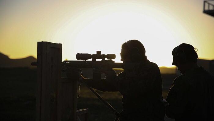 A sniper with the Special Operations Battalion, Brazilian Marine Corps, uses a wall for support as he fires at targets during a subject matter expert exchange with snipers from the U.S. Marine Corps Training Cell, 1st Reconnaissance Battalion, 1st Marine Division, at Marine Corps Base Camp Pendleton, California, March 16, 2016. Snipers from both countries gathered to exchange knowledge and experiences regarding techniques and procedures used by expert marksmen from both militaries.
