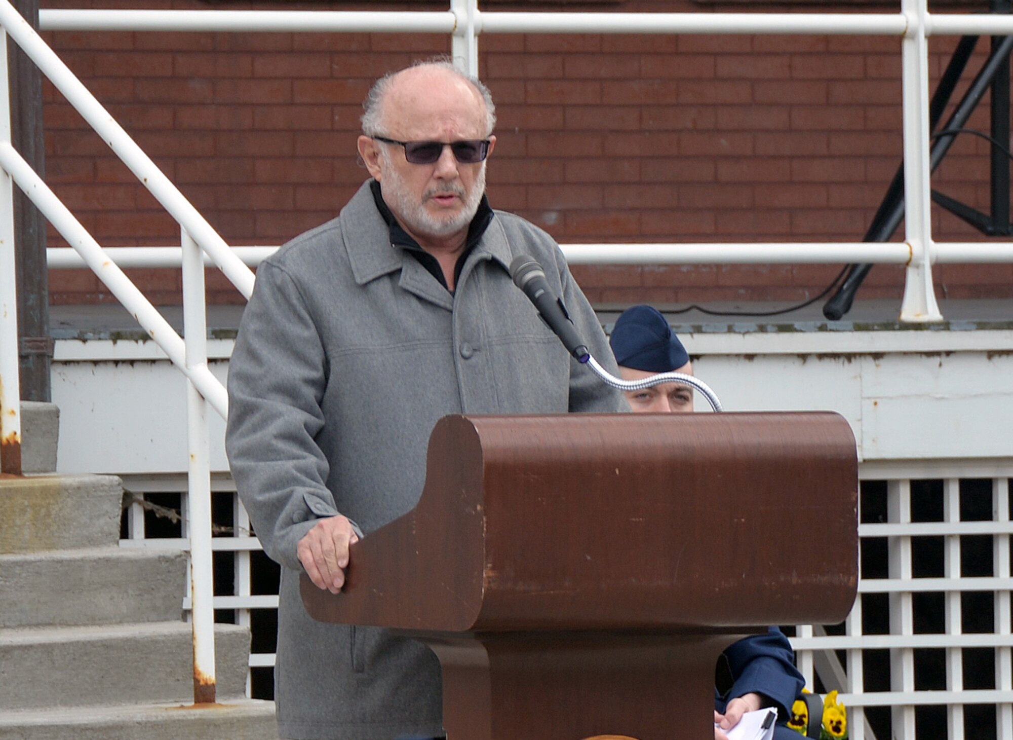 Retired U.S. Air Force Lt. Col. Kingdon Hawes speaks at a 664 remembrance ceremony held March 15, 2016, at Offutt Air Force Base, Neb. The event was held exactly 35 years ago to the day when U.S. Air Force Maj. William R. Bennett, Capt. Larry A. Mayfield, 1st Lt. Loren O. Ginter, Master Sgt. Steven L. Kish, Staff Sgt. Steven C. Balcer and Staff Sgt. Harry L. Parsons III, lost their lives when their RC-135S Cobra Ball crashed upon landing in Shemya Air Force Base, Alaska.
