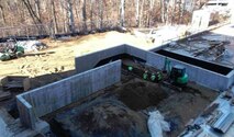 Workers make preparations to centralize the heating and air conditioning systems of four buildings into a central utility plant at Defense Intelligence Agency, Bethesda, Maryland. Huntsville Center's UESC program integrated the project with DIA and the USACE Baltimore District.